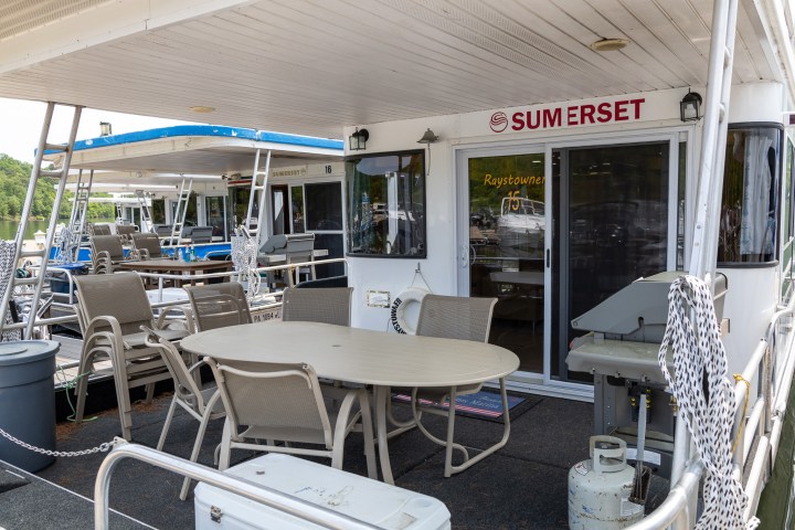 a group of lawn chairs sitting on top of a table