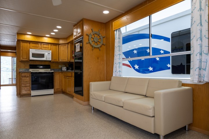 a room filled with furniture and a flat screen tv