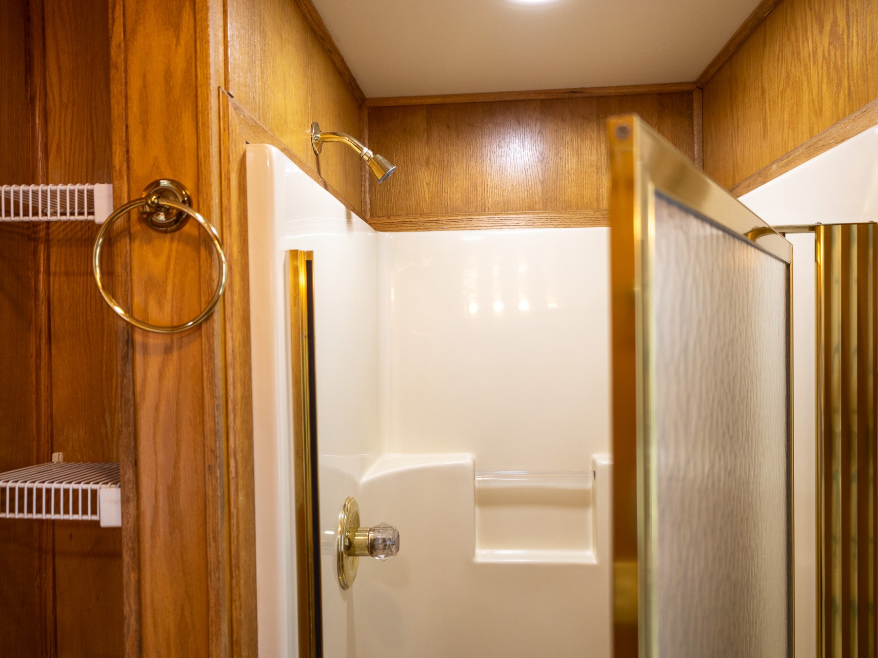 a close up of a shower in a small room