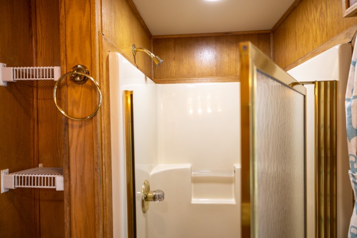 a close up of a shower in a small room