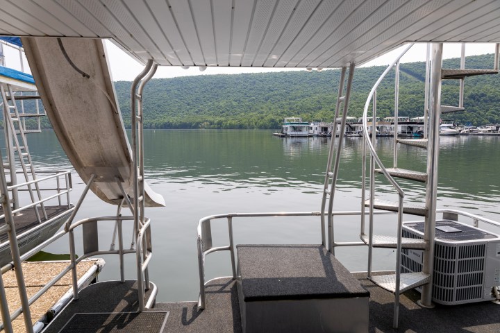 a chair next to a body of water