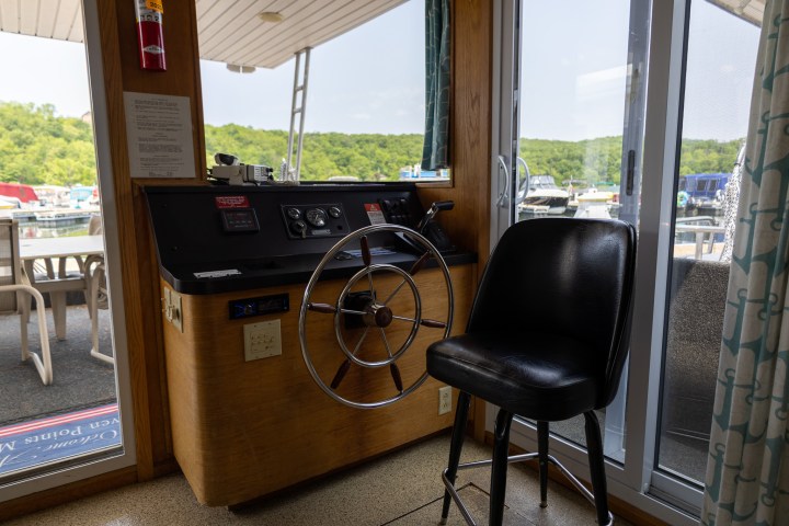a chair sitting in front of a window