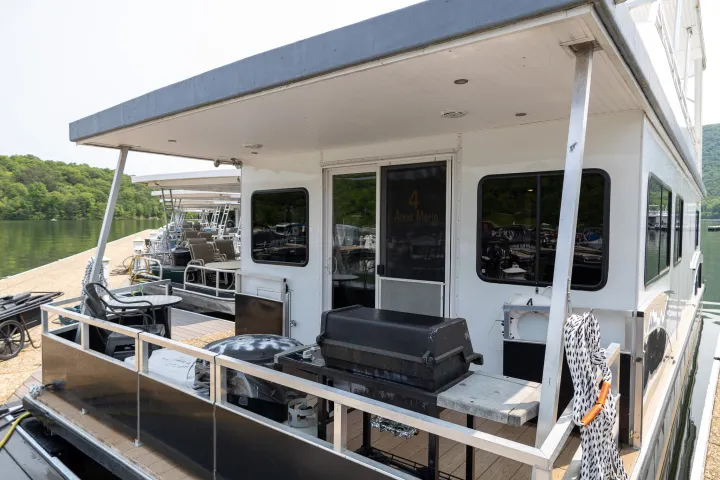 a train is parked on the side of a building