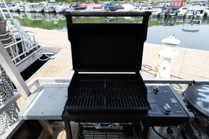 a laptop computer sitting on top of a wooden table