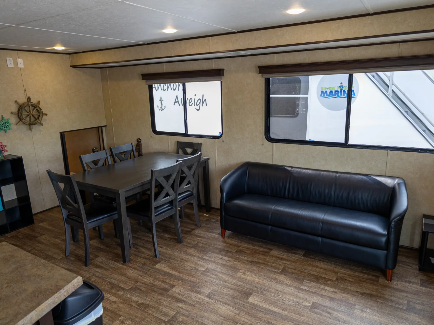a living room filled with furniture and a flat screen tv
