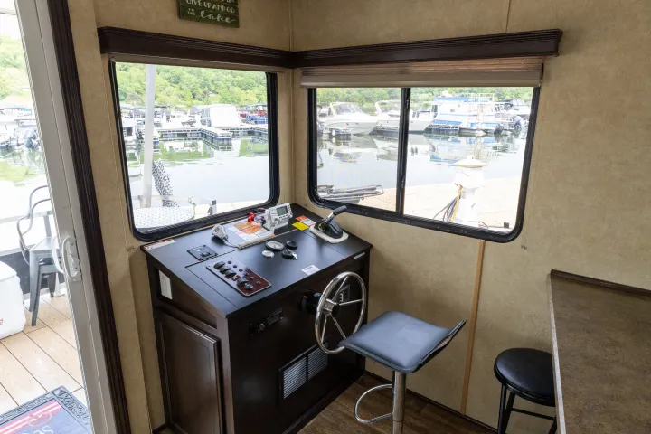 a room with a television and a window