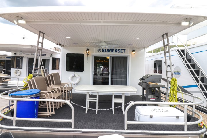 a chair sitting in front of a building