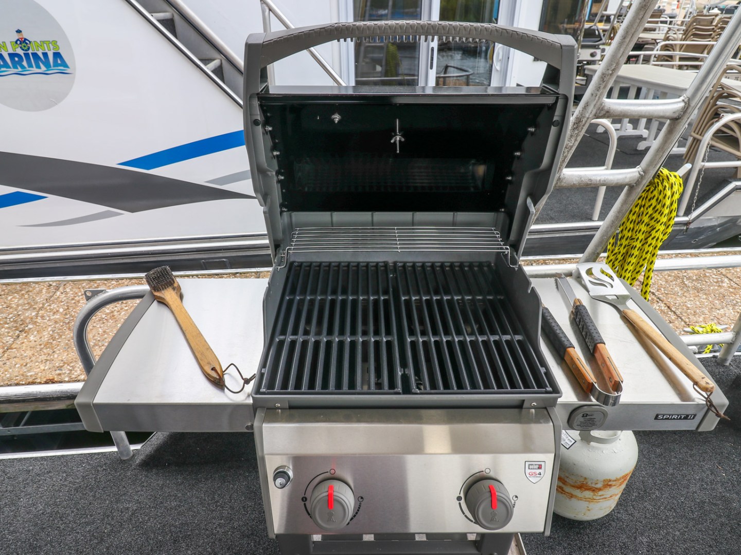 a stove top oven sitting next to a grill