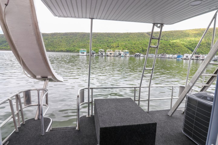 a couple of lawn chairs sitting on top of a chair