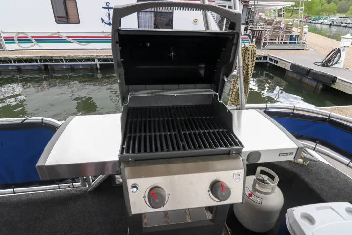 a boat sitting on top of a car