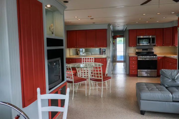 a kitchen with a dining room table