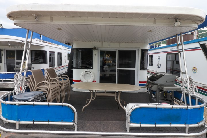 a boat sitting on top of a building
