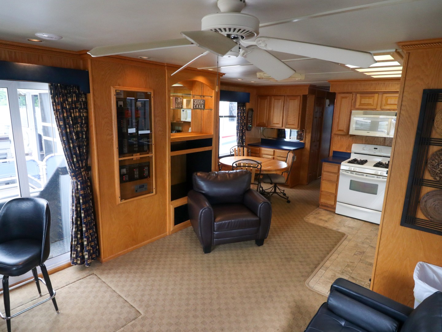 a living room filled with furniture and a large window