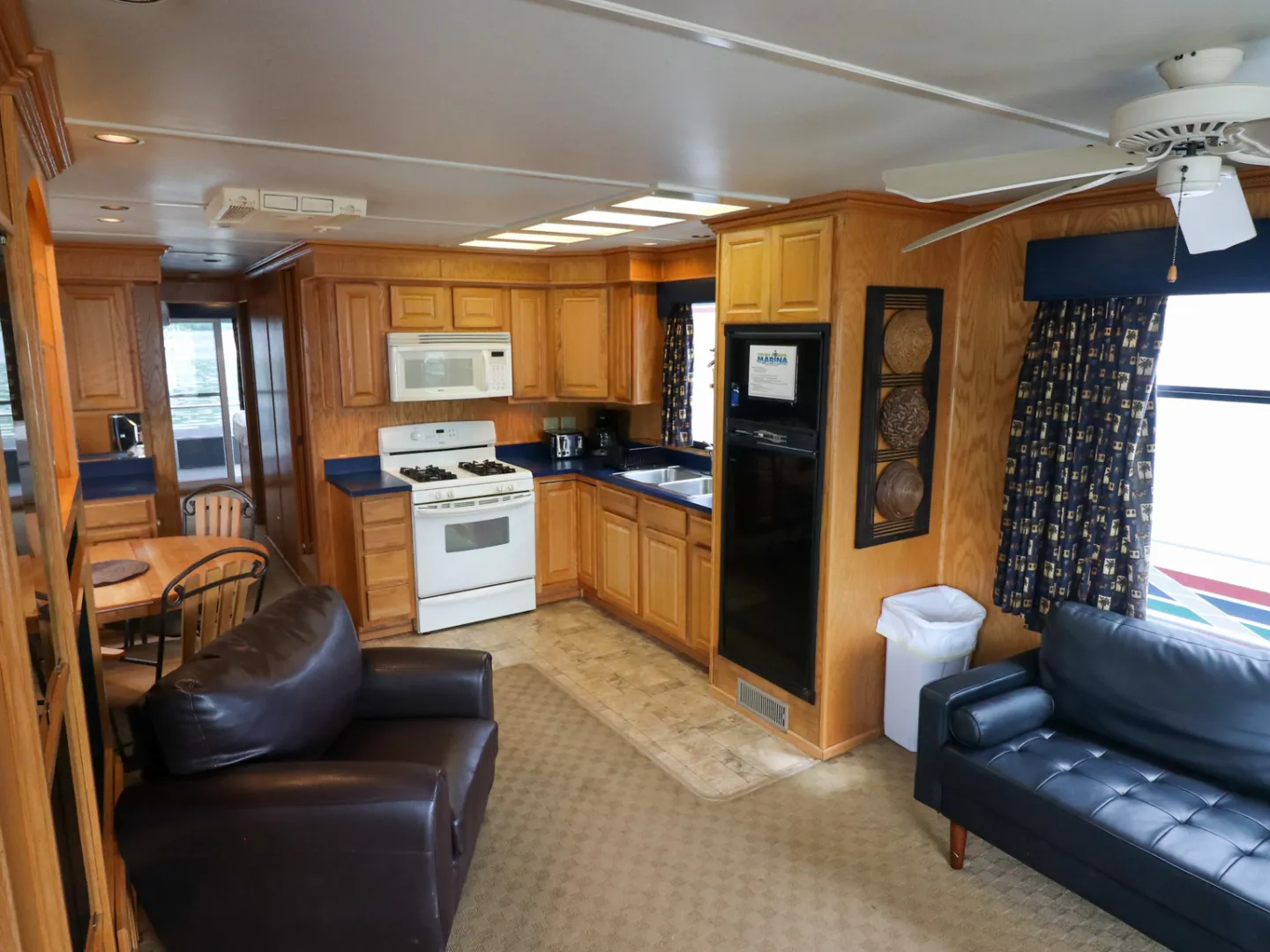 a living room filled with furniture and a flat screen tv