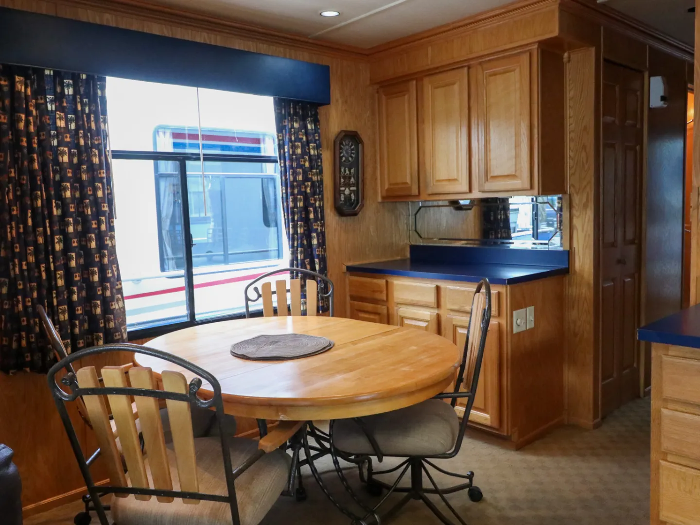 a kitchen with a dining room table