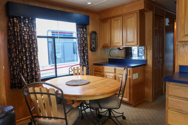 a kitchen with a dining room table