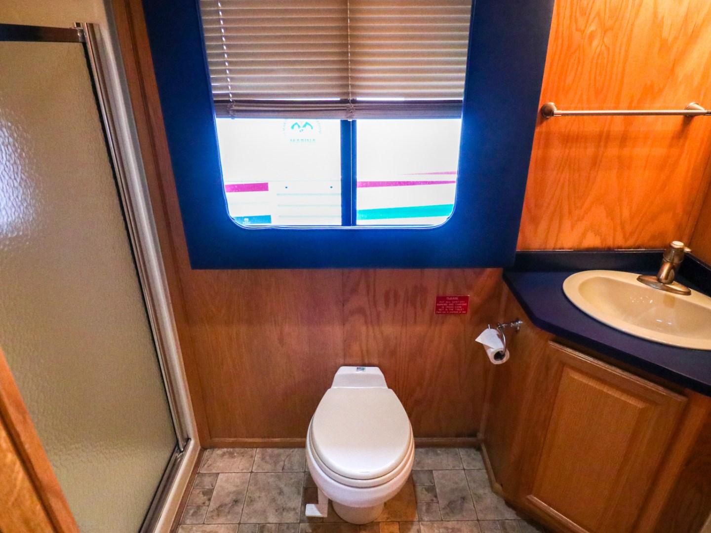 a room with a sink and a mirror