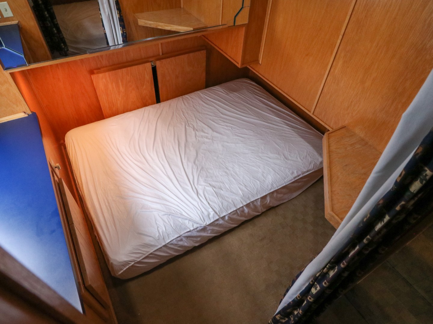 a bed with a wooden table