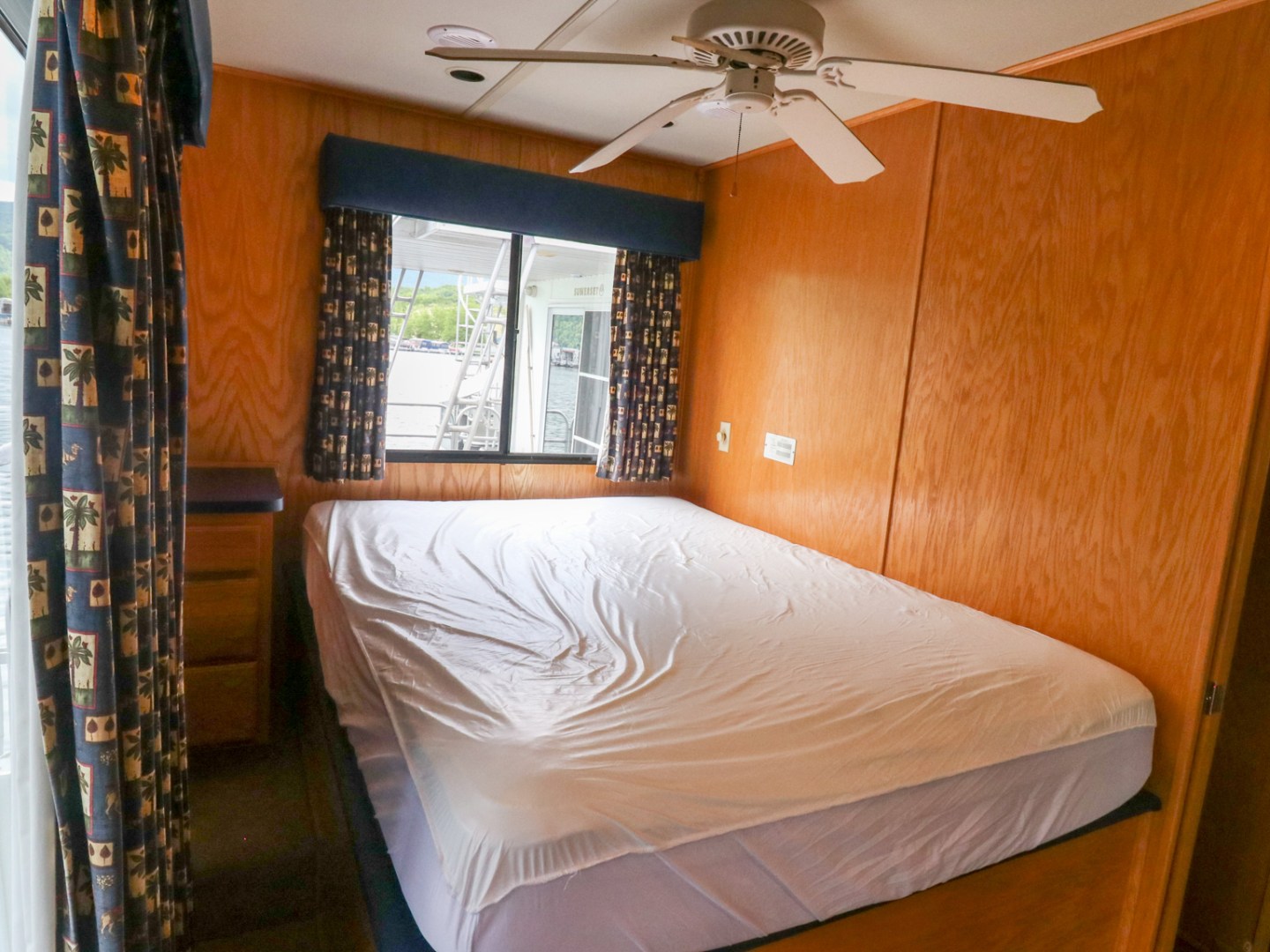 a bedroom with a bed in a room