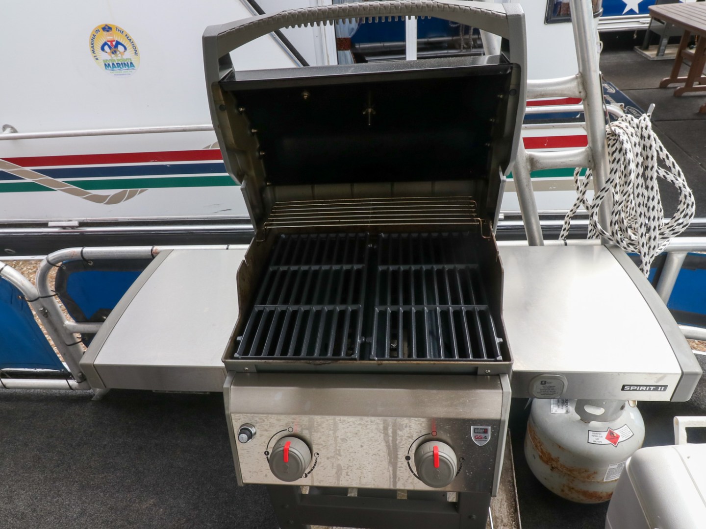 a stove top oven sitting inside of a car