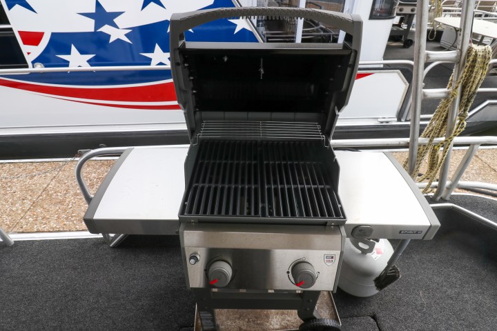 a boat sitting on top of a car