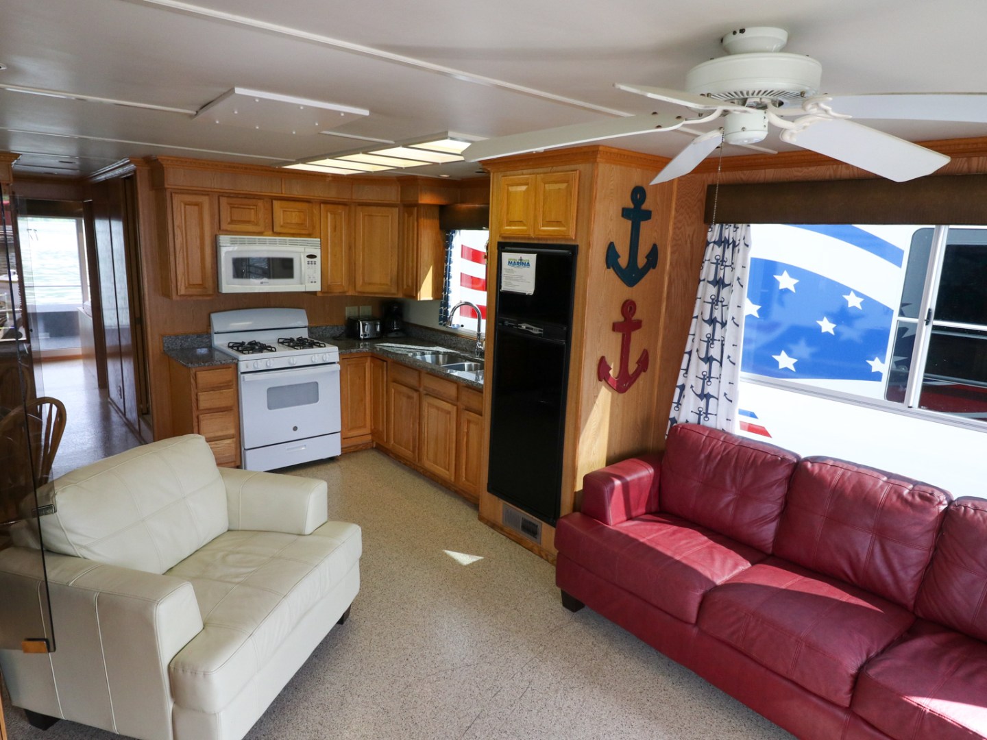 a living room filled with furniture and a flat screen tv