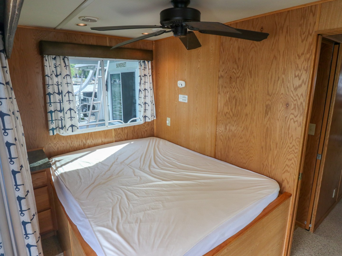 a bed with a wooden door