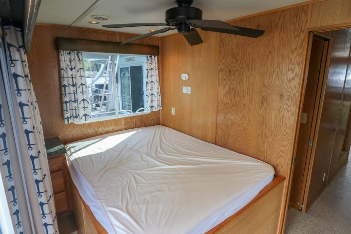 a bed with a wooden door