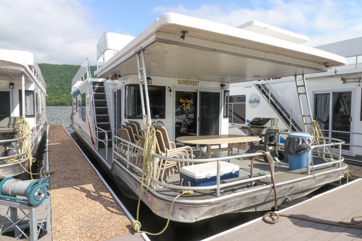 a train is parked on the side of a building