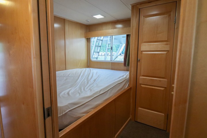 a bedroom with a wooden door