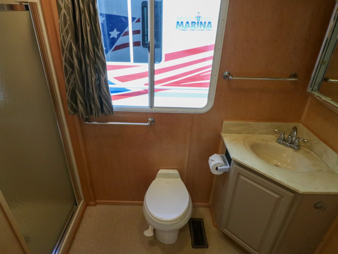a room with a sink and a mirror