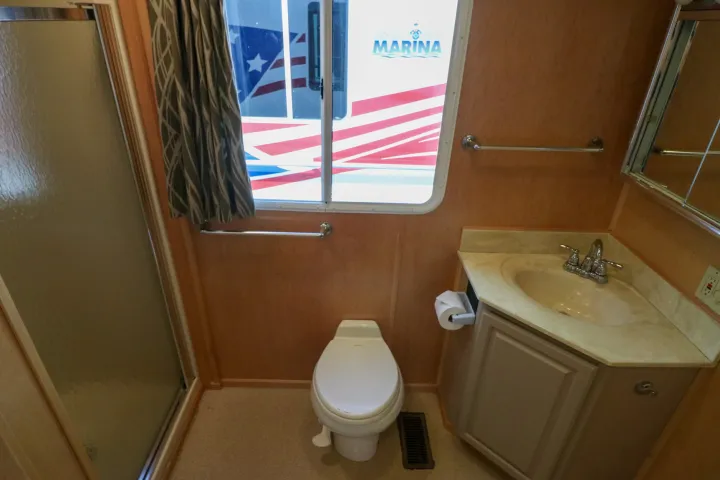 a room with a sink and a mirror