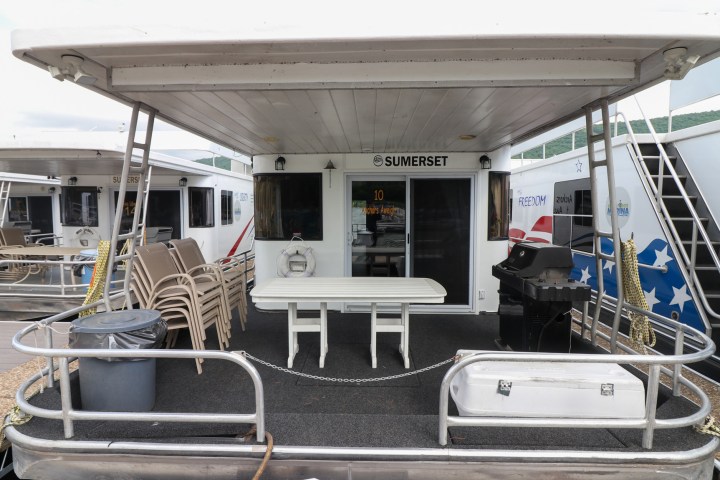 a chair sitting in front of a building