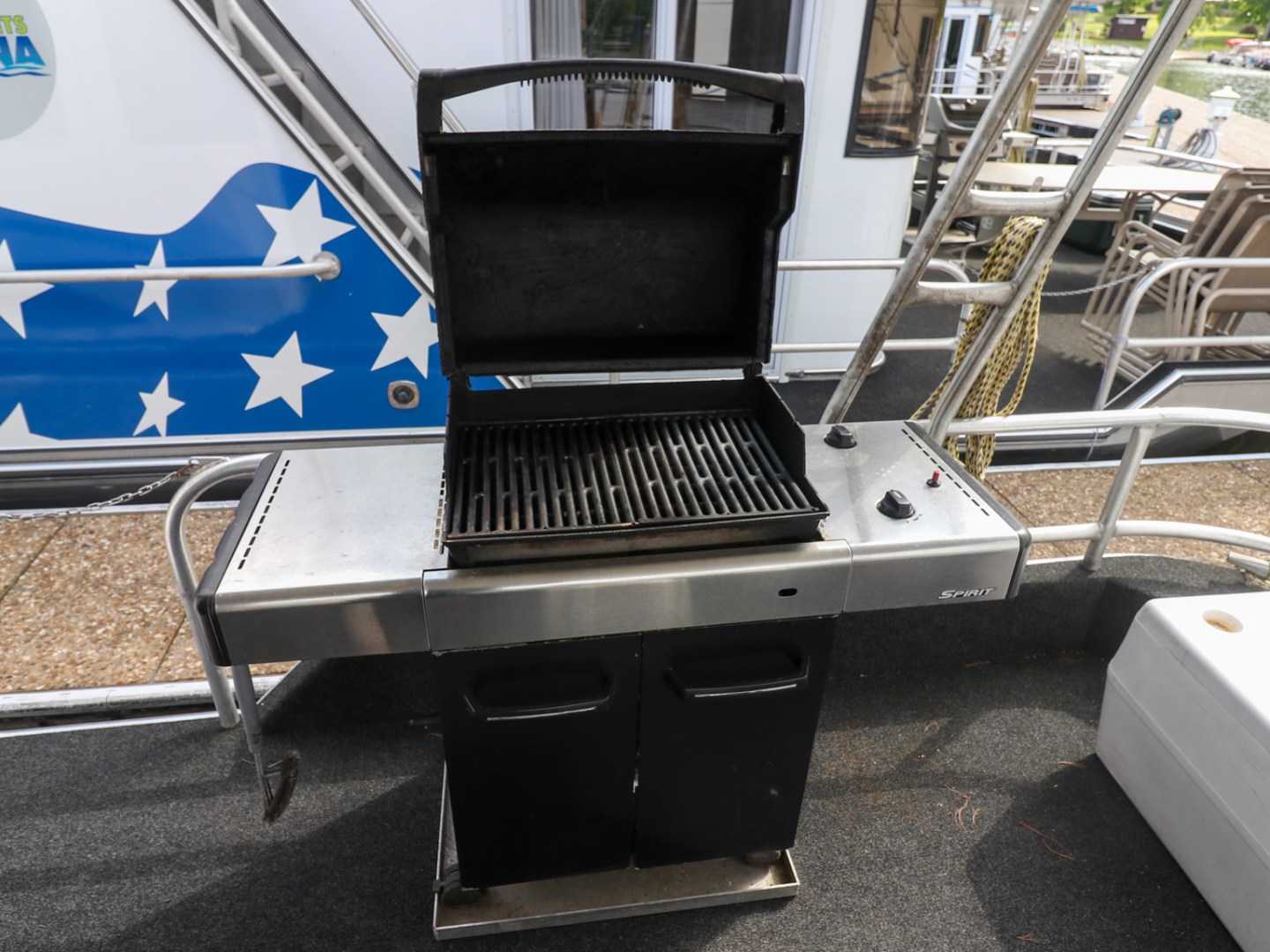a laptop computer sitting on top of a chair