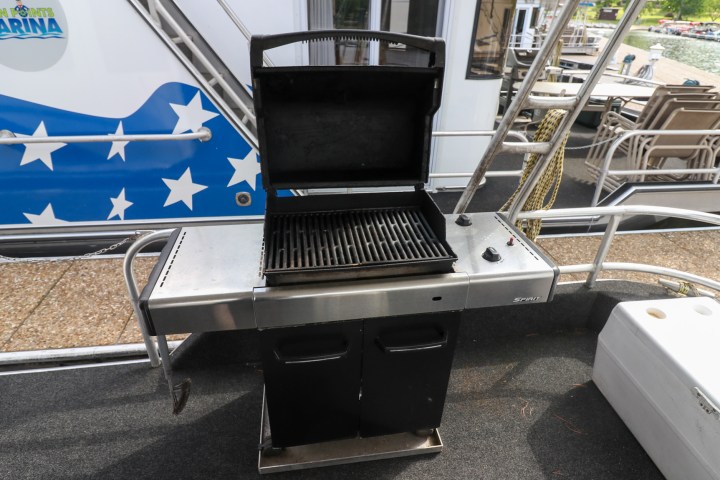 a laptop computer sitting on top of a chair