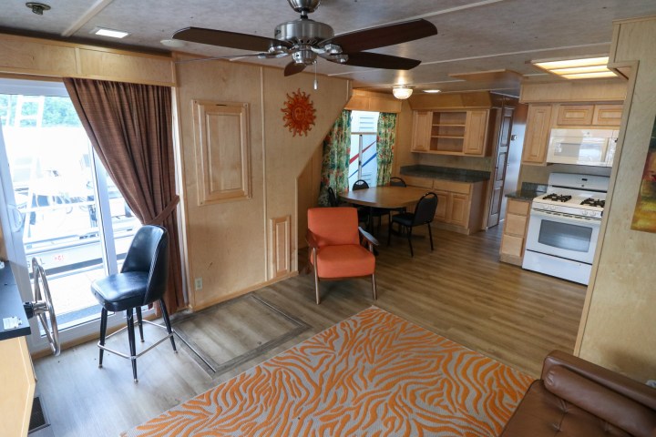 a living room filled with furniture and a fire place