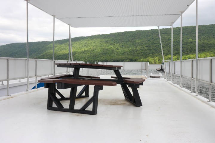 a wooden bench on the side of a ramp
