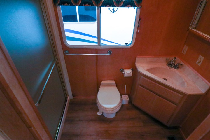 a sink sitting under a window