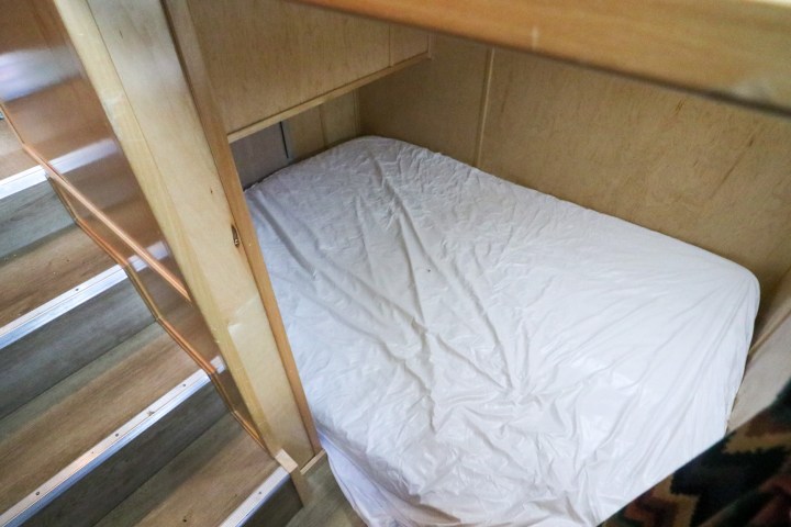 a cat lying on a bed