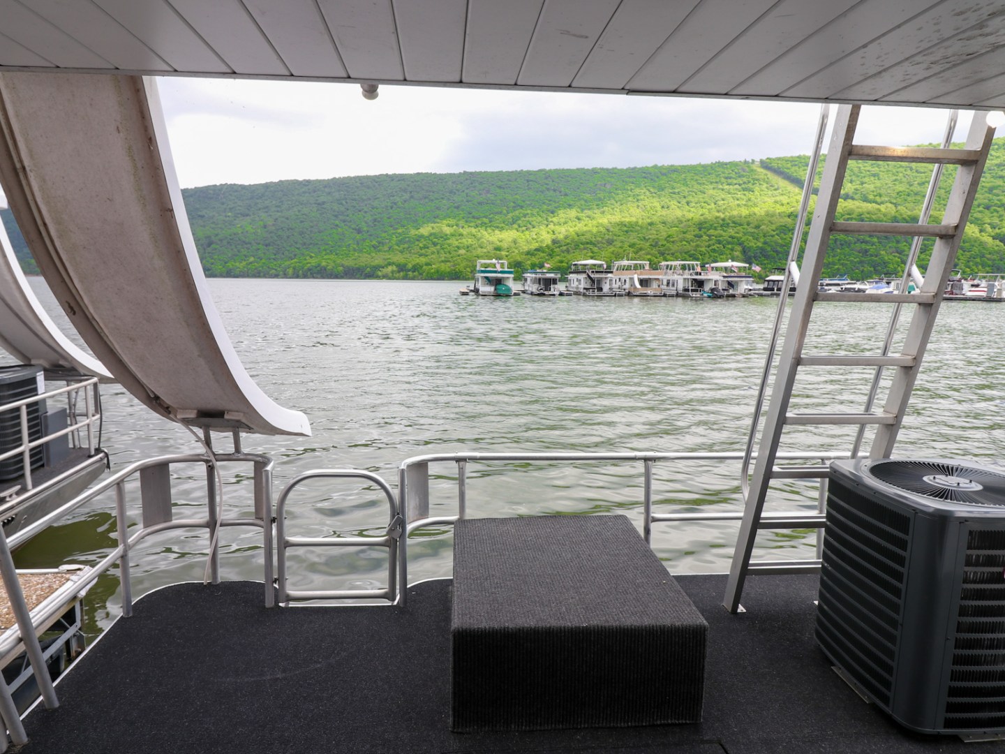 a chair sitting in front of a fence
