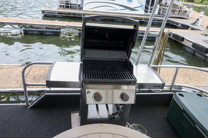 a boat sitting on top of a picnic table