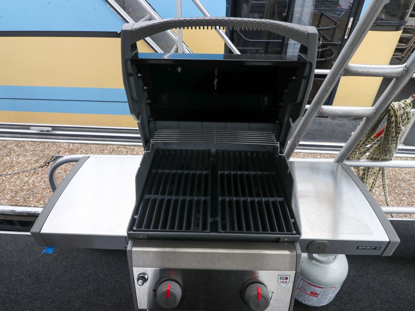 a microwave oven sitting on top of a chair