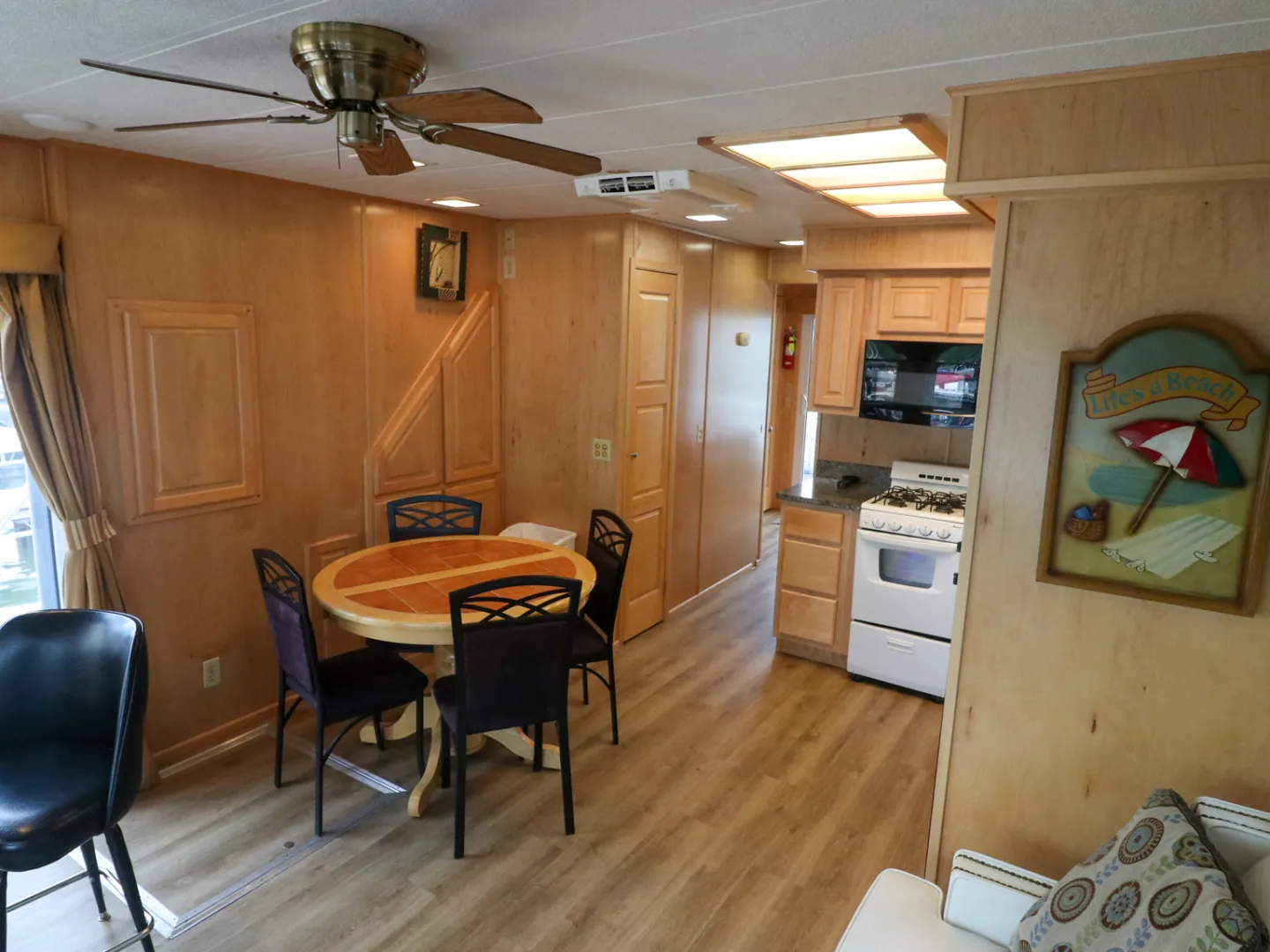 a room filled with furniture on top of a wooden chair