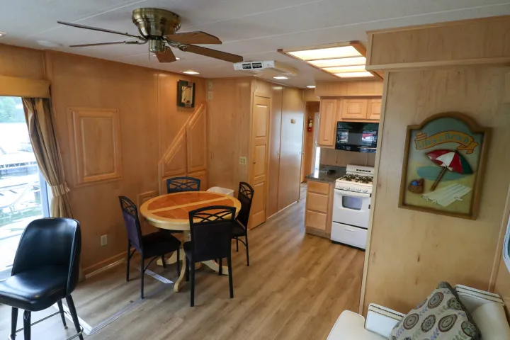a room filled with furniture on top of a wooden chair