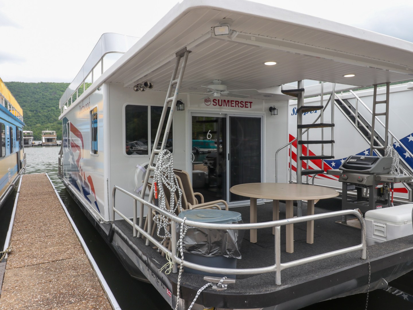 a train is parked on the side of a building