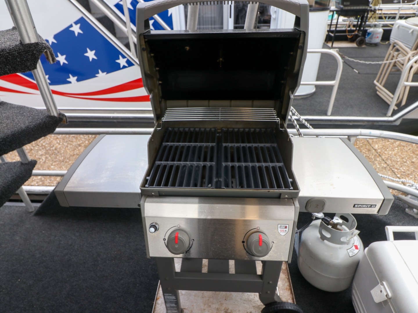 a boat sitting on top of a car