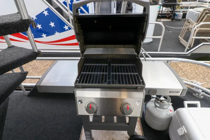 a boat sitting on top of a car