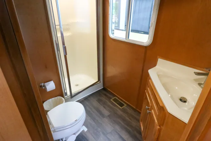 a sink sitting under a window