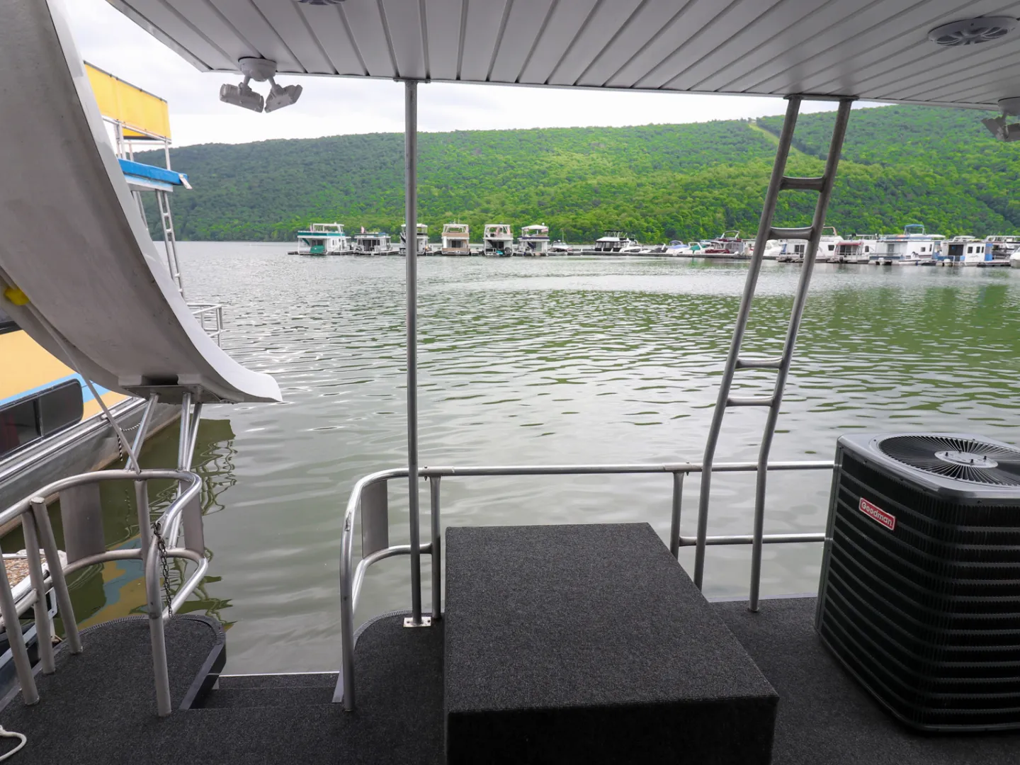 a chair sitting in front of a pool of water