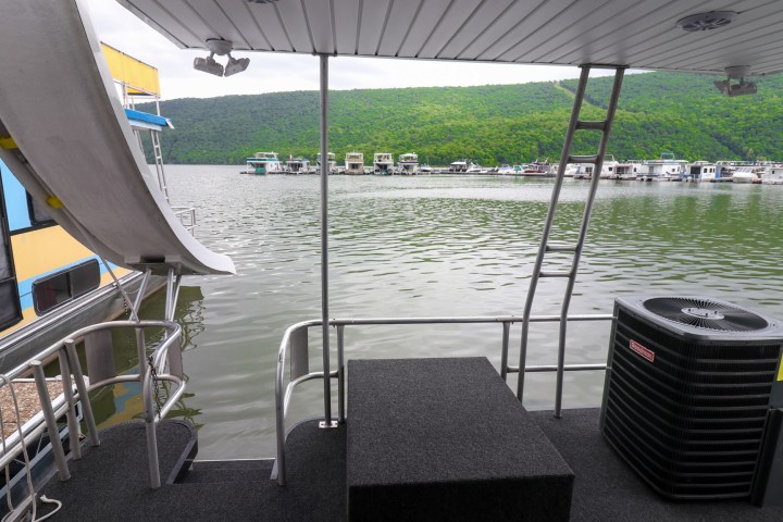 a chair sitting in front of a pool of water